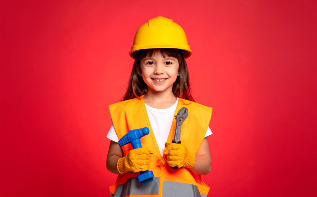 nina ingeniera juego fondo rojo - English4Kids